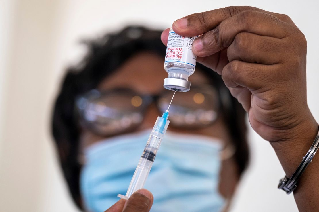 A health worker prepares a dose of the Moderna Covid vaccine at the Saint Damien Hospital in Port-au-Prince, Haiti July 19, 2021.