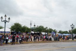 Migrants who were sent back to Mexico under Title 42 wait in line for food and supplies in a camp across the US-Mexico border in Reynosa, Tamaulipas, Mexico, on July 10, 2021.