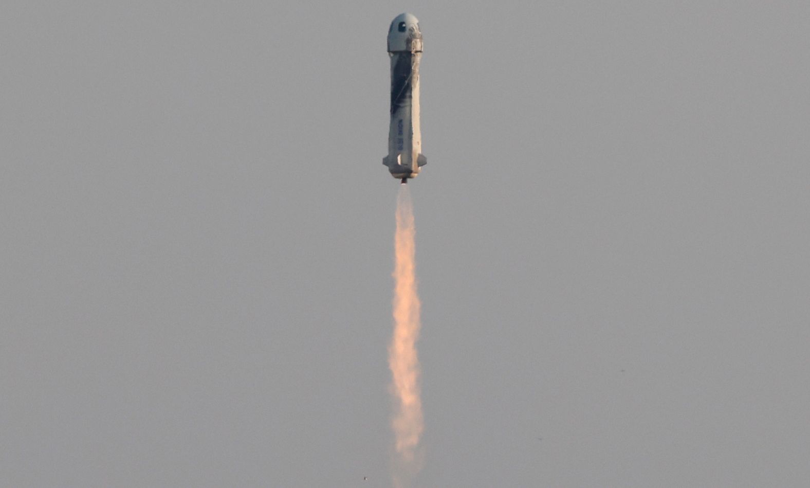 The rocket lifts off.