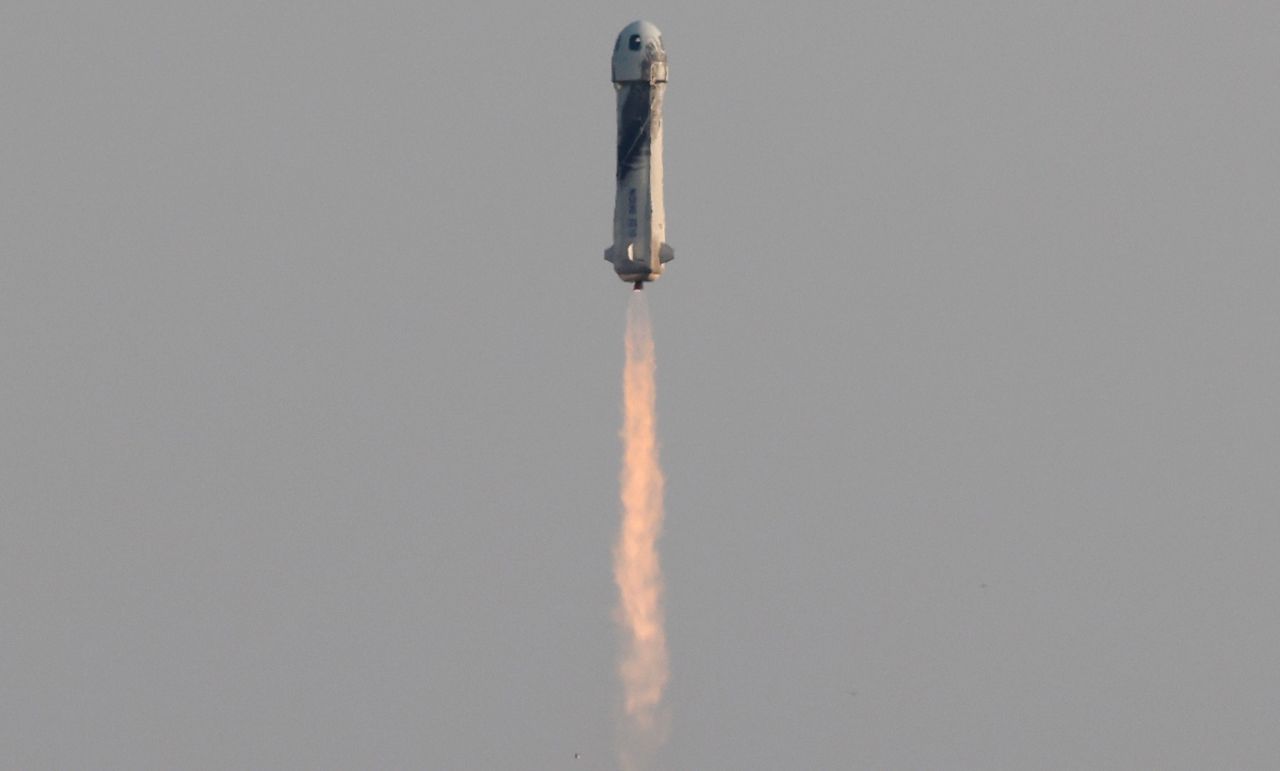The rocket lifts off.