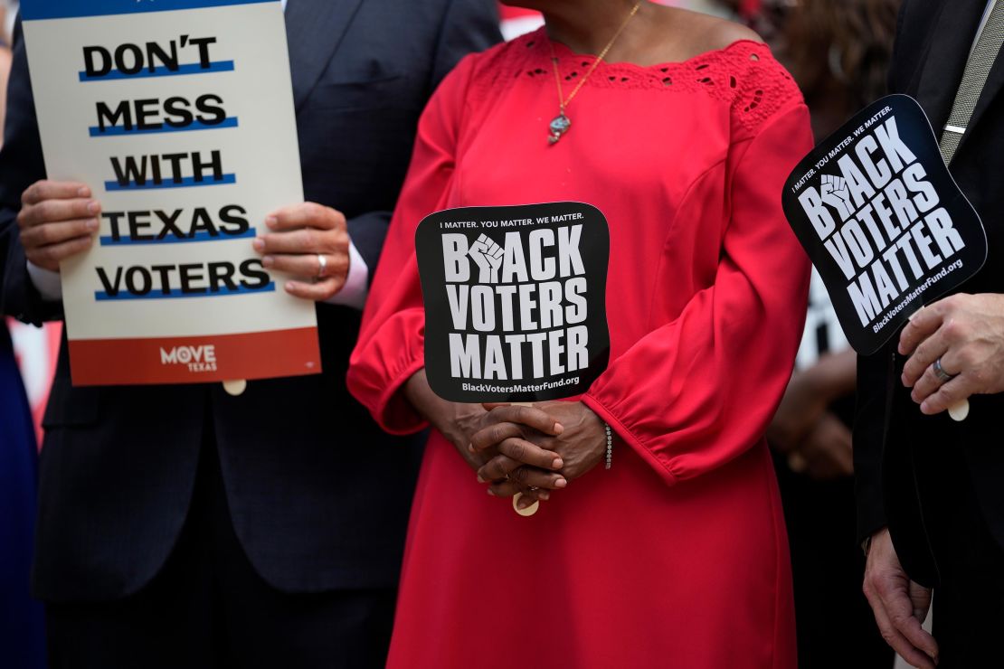 Democratic caucus members of the Texas House join a rally on the steps of the Texas Capitol to support voting rights on July 8, 2021, in Austin.
