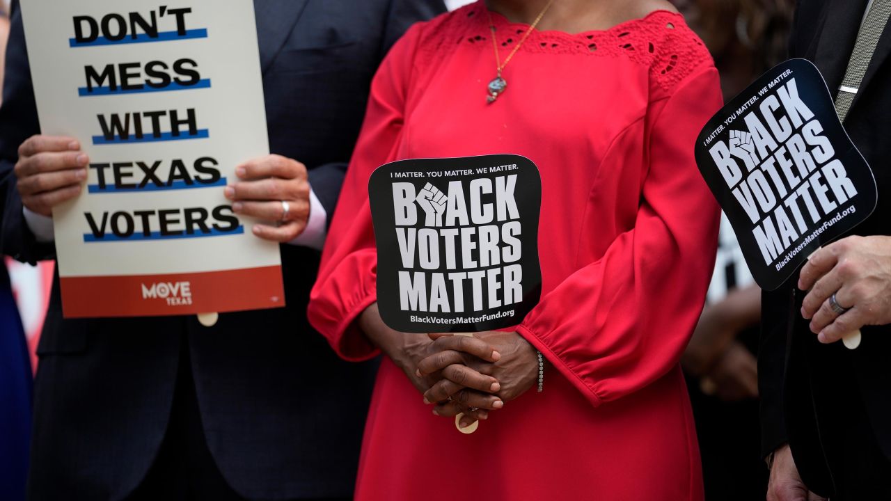 Democratic caucus members of the Texas House join a rally on the steps of the Texas Capitol to support voting rights, July 8, 2021.