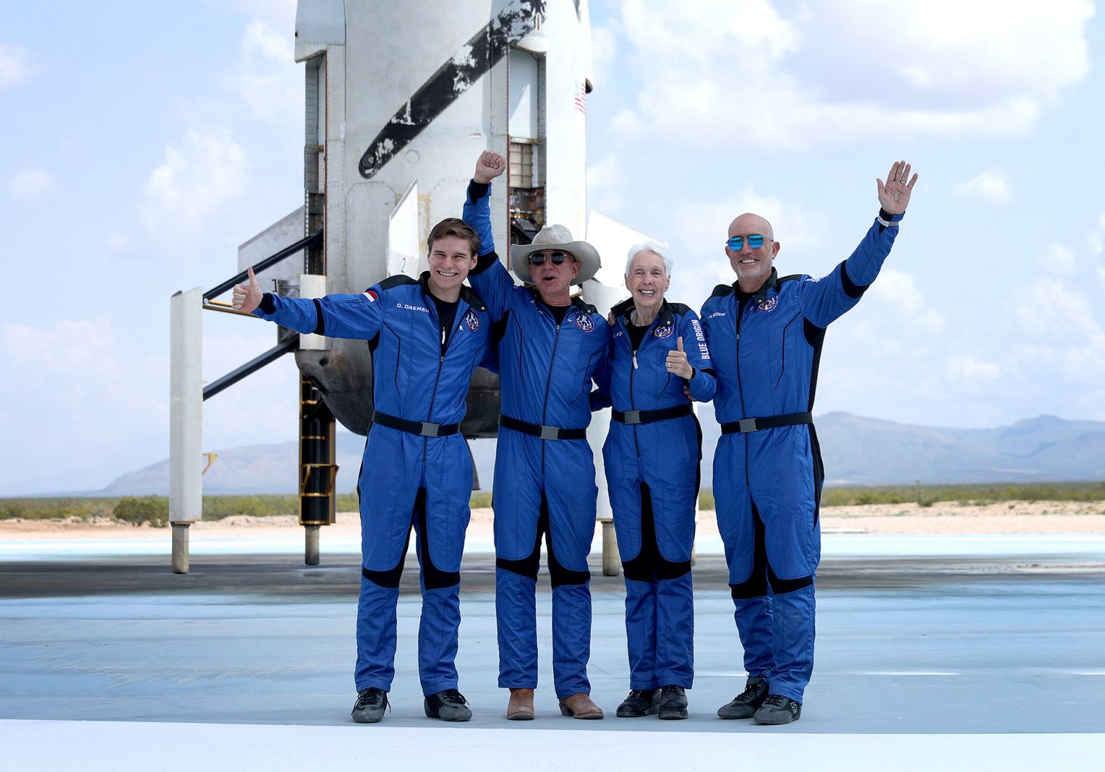 From left, Oliver Daemen, Bezos, Wally Funk and Bezos' brother Jeff pose for a picture after <a  target="_blank">flying into space</a> in July 2021. The trip marked the first-ever crewed flight of Blue Origin's suborbital space tourism rocket, New Shepard.