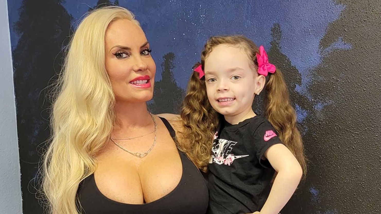 Coco Austin holds her daughter Chanel whose father is Austin's husband, Ice T. 