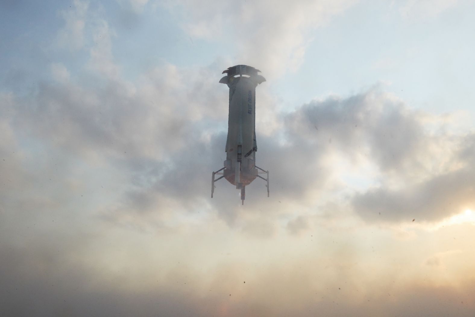 The rocket booster prepares to land.