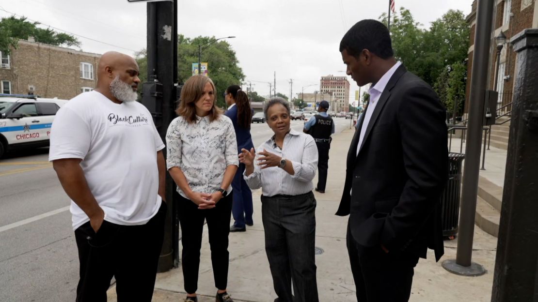 From left, TJ Crawford, director of the Garfield Park Rite to Wellness Collaborative; Gia Biagi, commissioner for city DOT; Mayor Lori Lightfoot; and CNN's Omar Jimenez