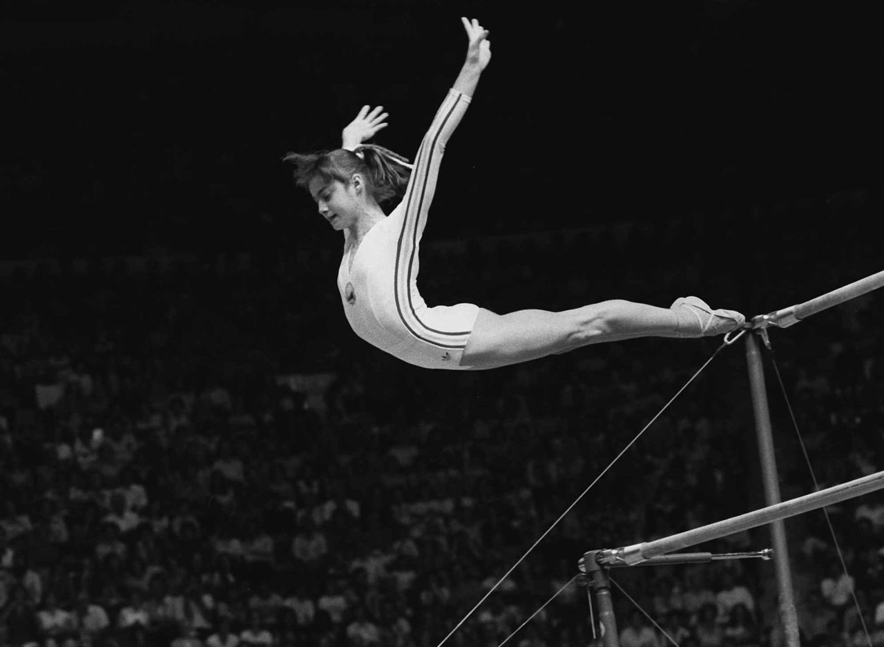 Nadia Comaneci became the first gymnast in Olympic history to score a perfect 10 in an event — and she did it seven times at the 1976 Olympics. The Romanian, who collected three golds in Montreal, finished with three 10s on the balance beam and four on the uneven bars.