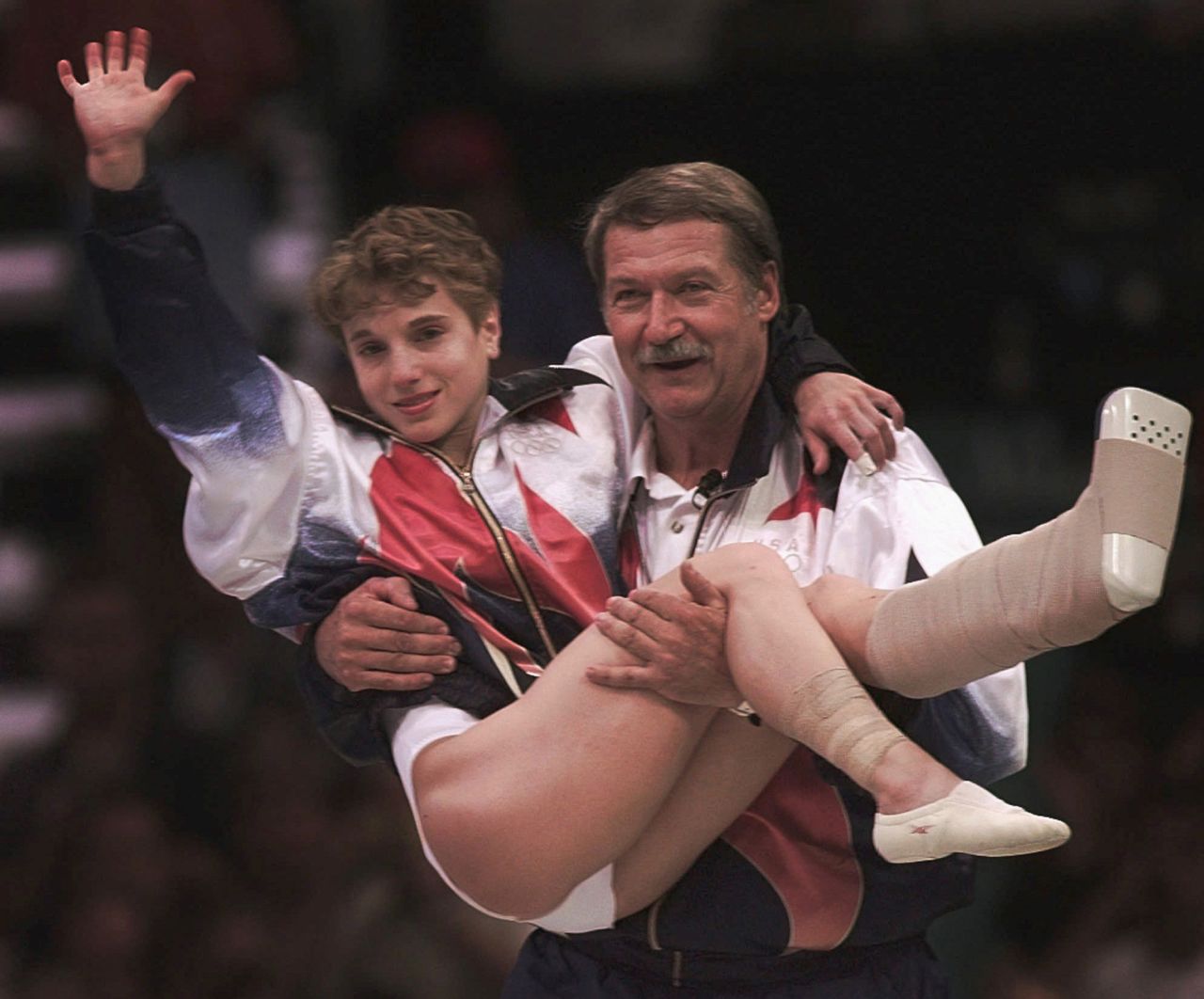 US gymnast Kerri Strug injured her ankle on her second-to-last vault during the team competition at the 1996 Summer Games. But with a gold medal in the balance, she still had to go once more and land on her feet. She did just that, clinching victory and making her an American hero.