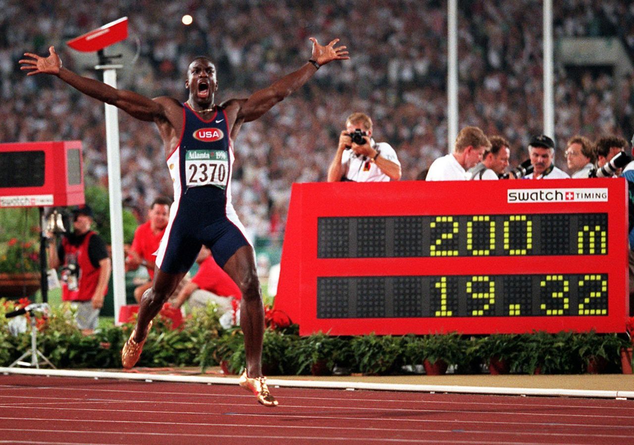 Michael Johnson and his flashy gold shoes set a new world record in the 200 meters, finishing in 19.32 seconds in 1996. The American also added gold in the 400 meters that year.