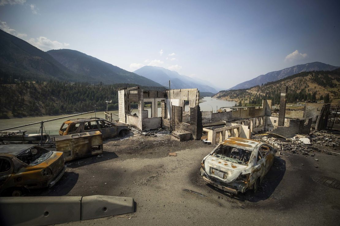 Burned cars and structures are seen in Lytton, British Columbia, on Friday, July 9, 2021.