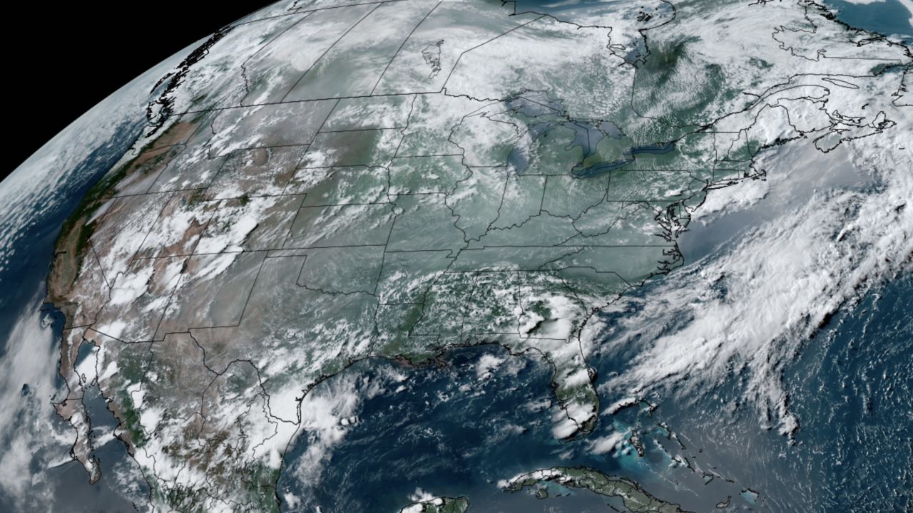 Wildfire smoke (milky white appearance) is shown on this satellite image from Wednesday afternoon.