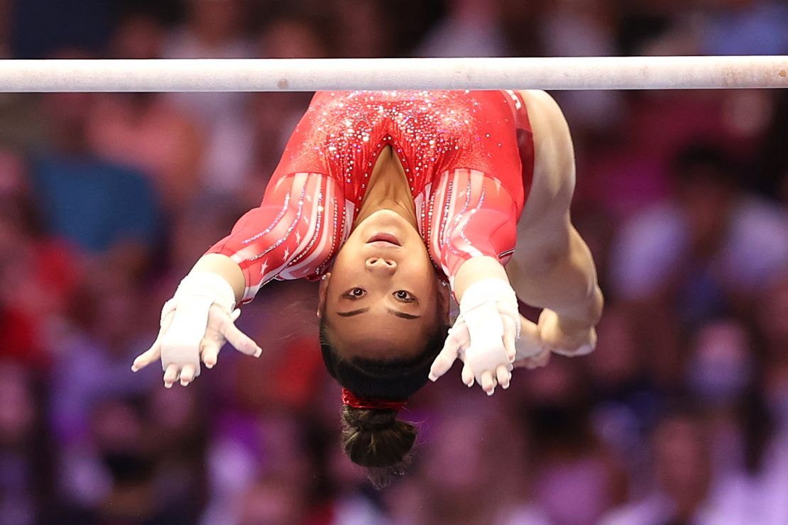  Suni Lee competes on the uneven bars during the Women's competition of the 2021 US Gymnastics Olympic Trials at America's Center on June 27, 2021.
