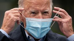 CHESTER, PA - OCTOBER 26: Democratic presidential nominee Joe Biden puts on a face mask while speaking to reporters at a voter mobilization center on October 26, 2020 in Chester, Pennsylvania. In Pennsylvania, Tuesday, October 27 is the last day to request a mail-in ballot or to vote early in person. (Photo by Drew Angerer/Getty Images)