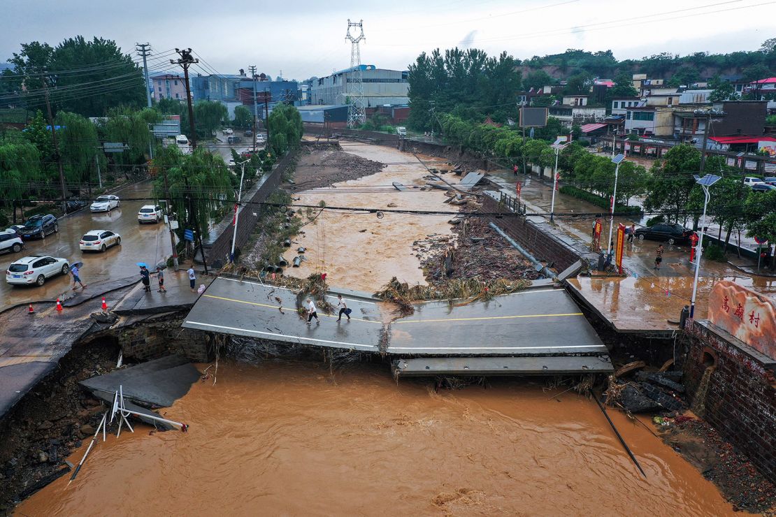 A damaged bridge following heavy rains which caused severe flooding in Gongyi in China's central Henan province on July 21, 2021