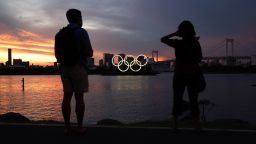 A barge carrying the Olympic Rings crosses Tokyo Bay on July 20, 2021. Tokyo was to host the 2020 Summer Olympic Games on July 24-August 9, 2020. The games were postponed for a year due to the COVID-19 pandemic, and are scheduled to take place on July 23-August 8, 2021.