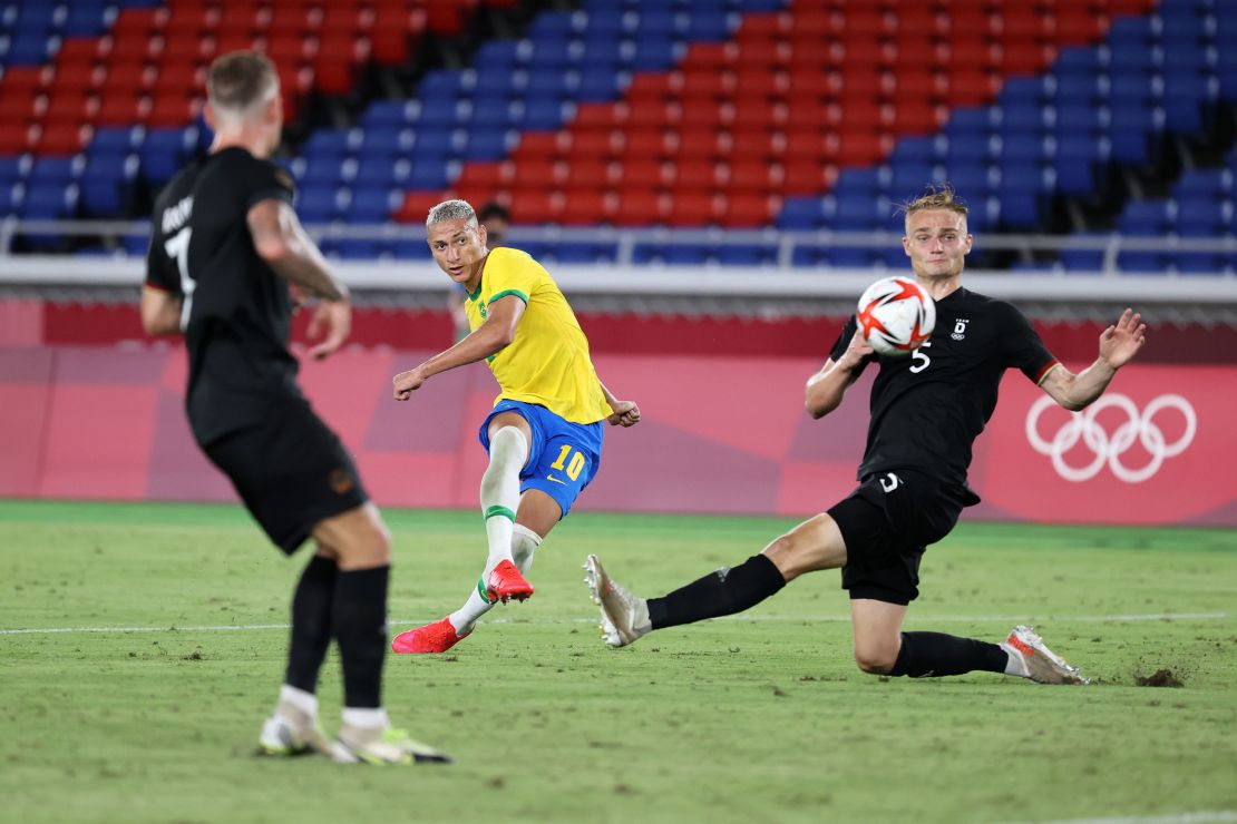 Richarlison (#10) scores Brazil's third goal during the men's first round Group D match against Germany during the Tokyo 2020 Olympic Games at the International Stadium Yokohama on July 22, 2021 in Yokohama, Tokyo, Japan. .