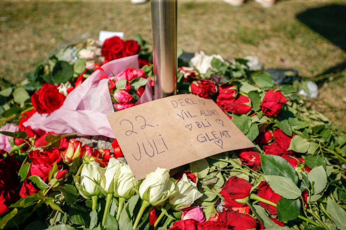 Floral tributes lie outside Oslo Cathedral on Thursday on the 10-year anniversary of the July 22, 2011 terrorist attacks -- commonly referred to in Norway as "22 Juli." 