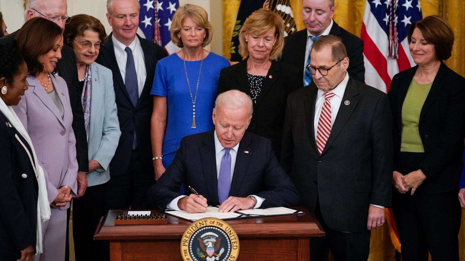 President Joe Biden signs H.R. 1652, the VOCA Fix to Sustain the Crime Victims Fund Act of 2021, on Thursday, July 22, 2021, in the East Room of the White House.