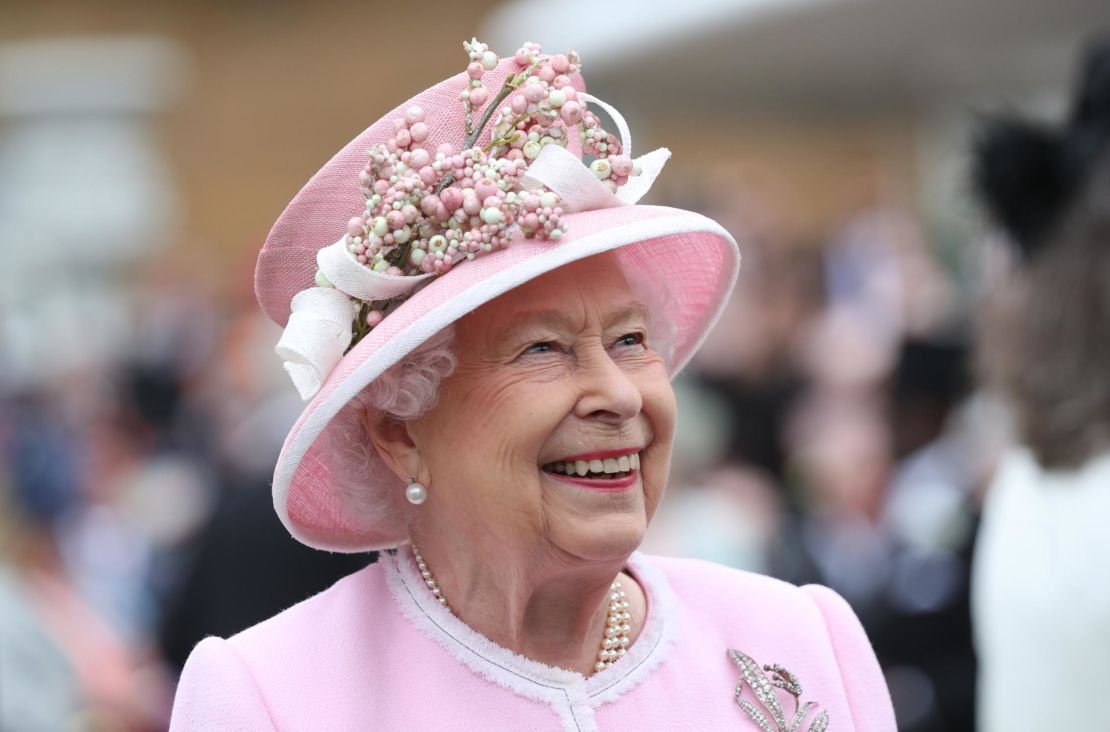 The Queen meets guests at the Royal Garden Party at Buckingham Palace in 2019. 