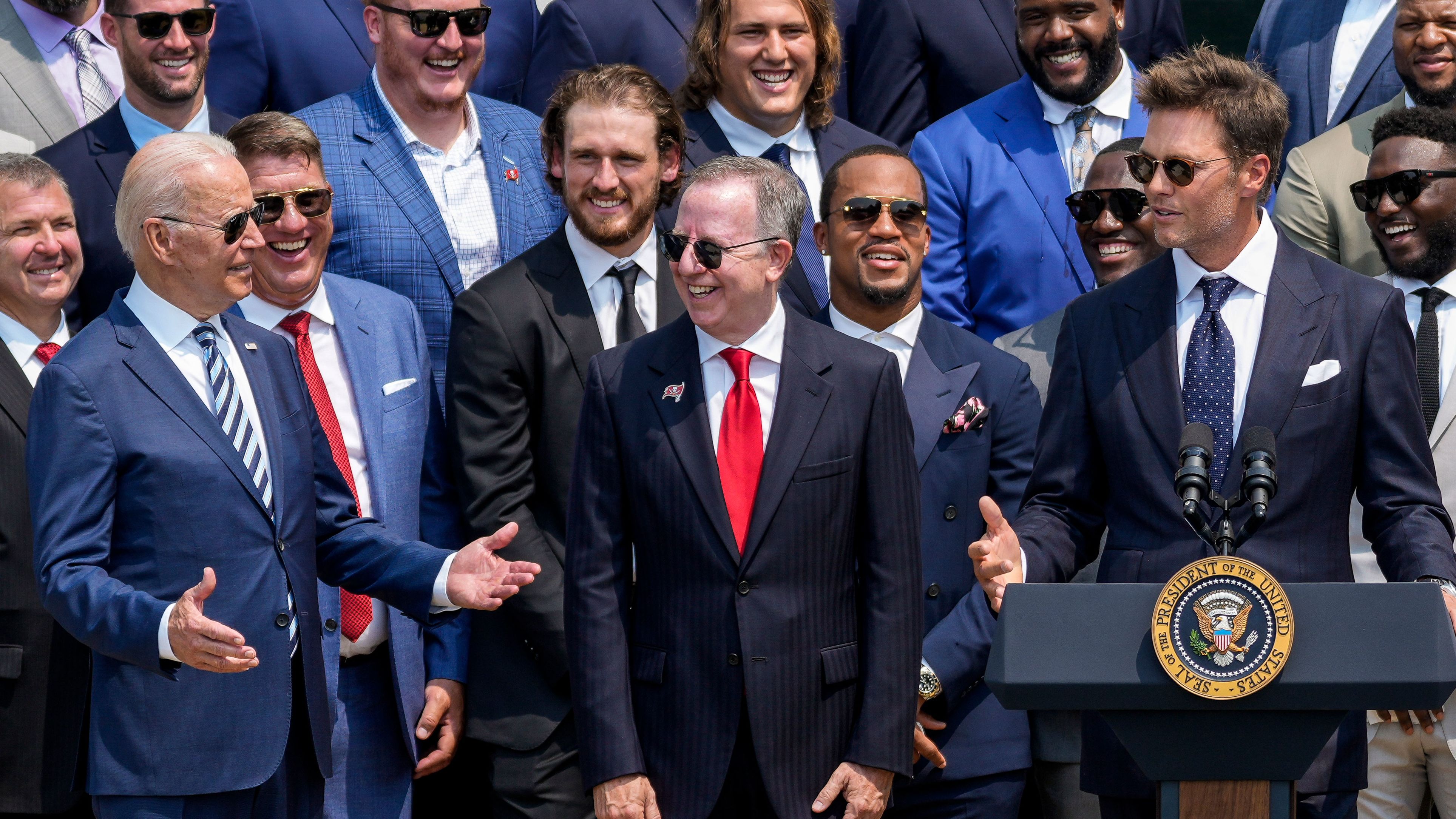 President Joe Biden laughs at a joke made by Brady, who was visiting the White House along with his Tampa Bay teammates in July 2021. One of Brady's jokes was about those who continue to deny that Biden won the 2020 election. "Not a lot of people think that we could have won (the Super Bowl). In fact, I think about 40% of people still don't think we won. You understand that, Mr. President?" Brady said to laughter. Biden responded, "I understand that."