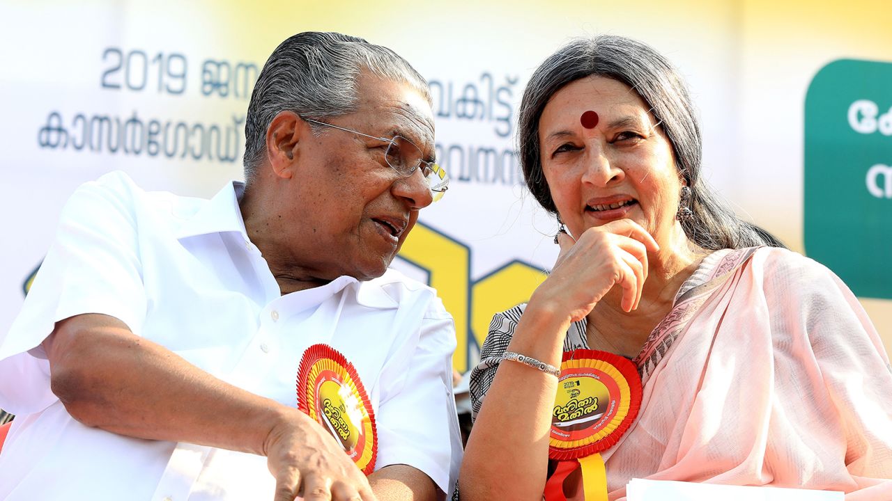 Chief Minister Pinarayi Vijayan with an activist during the "Women's Wall" protests in 2019.