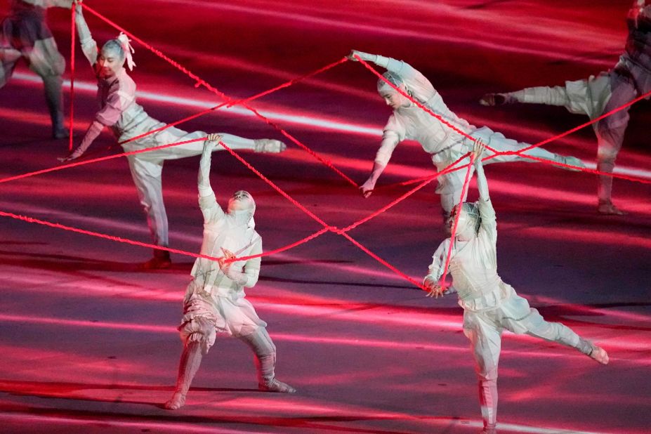 Dancers take part in the start of the opening ceremony.