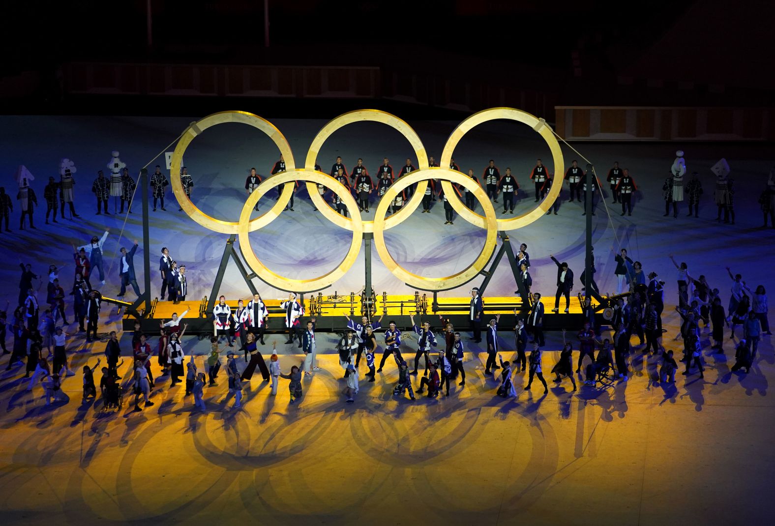 People perform during the opening ceremony.