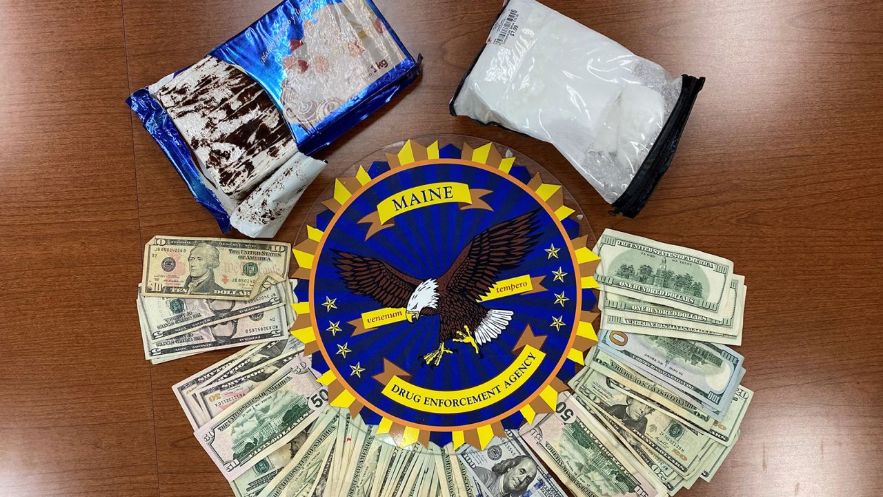 The Maine Drug Enforcement Agency seized four pounds of cocaine and about $1,900 in cash from a vehicle.