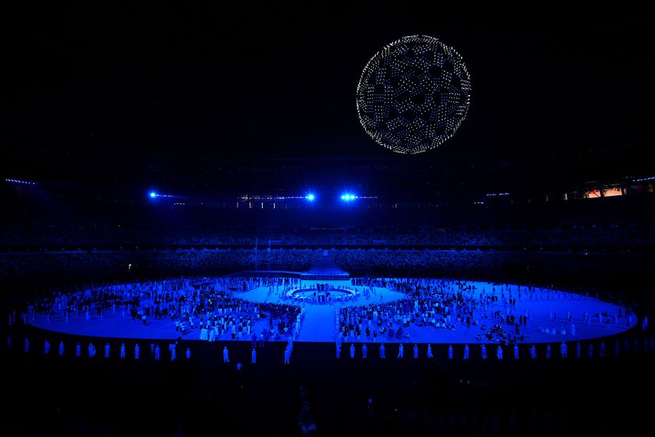 During one portion of the opening ceremony, there were 1,800 drones flying over the stadium to form a globe in the night sky. As the glowing drones soared over the stadium, performers sang "Imagine" by John Lennon.
