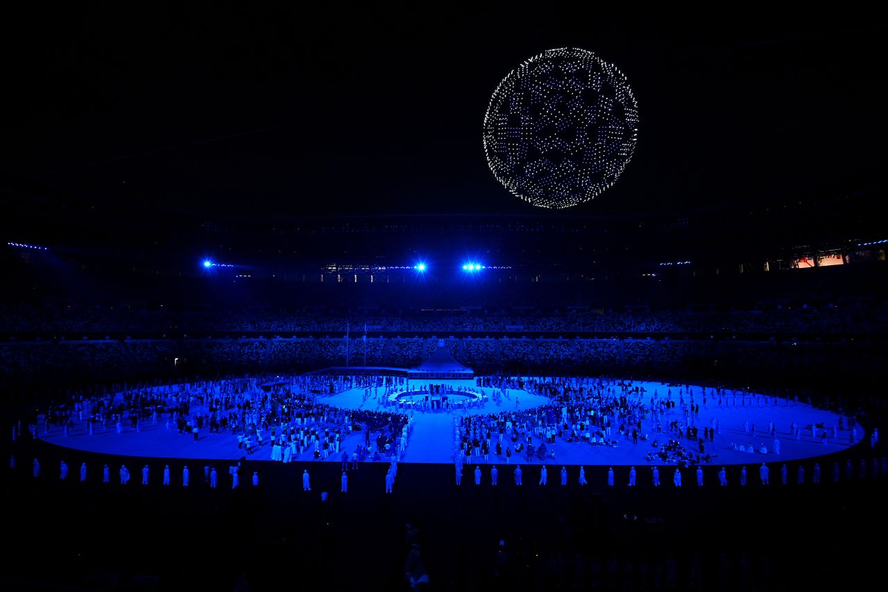 During one portion of the opening ceremony, there were 1,800 drones flying over the stadium to form a globe in the night sky. As the glowing drones soared over the stadium, performers sang "Imagine" by John Lennon.
