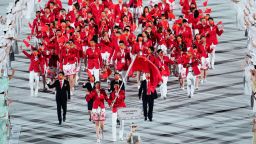 TOKYO, JAPAN - JULY 23: Flag bearers Zhu Ting and Zhao Shuai of Team China take part in the Parade of Nations during the Opening Ceremony of the Tokyo 2020 Olympic Games at Olympic Stadium on July 23, 2021 in Tokyo, Japan. (Photo by Wei Zheng/CHINASPORTS/VCG via Getty Images)