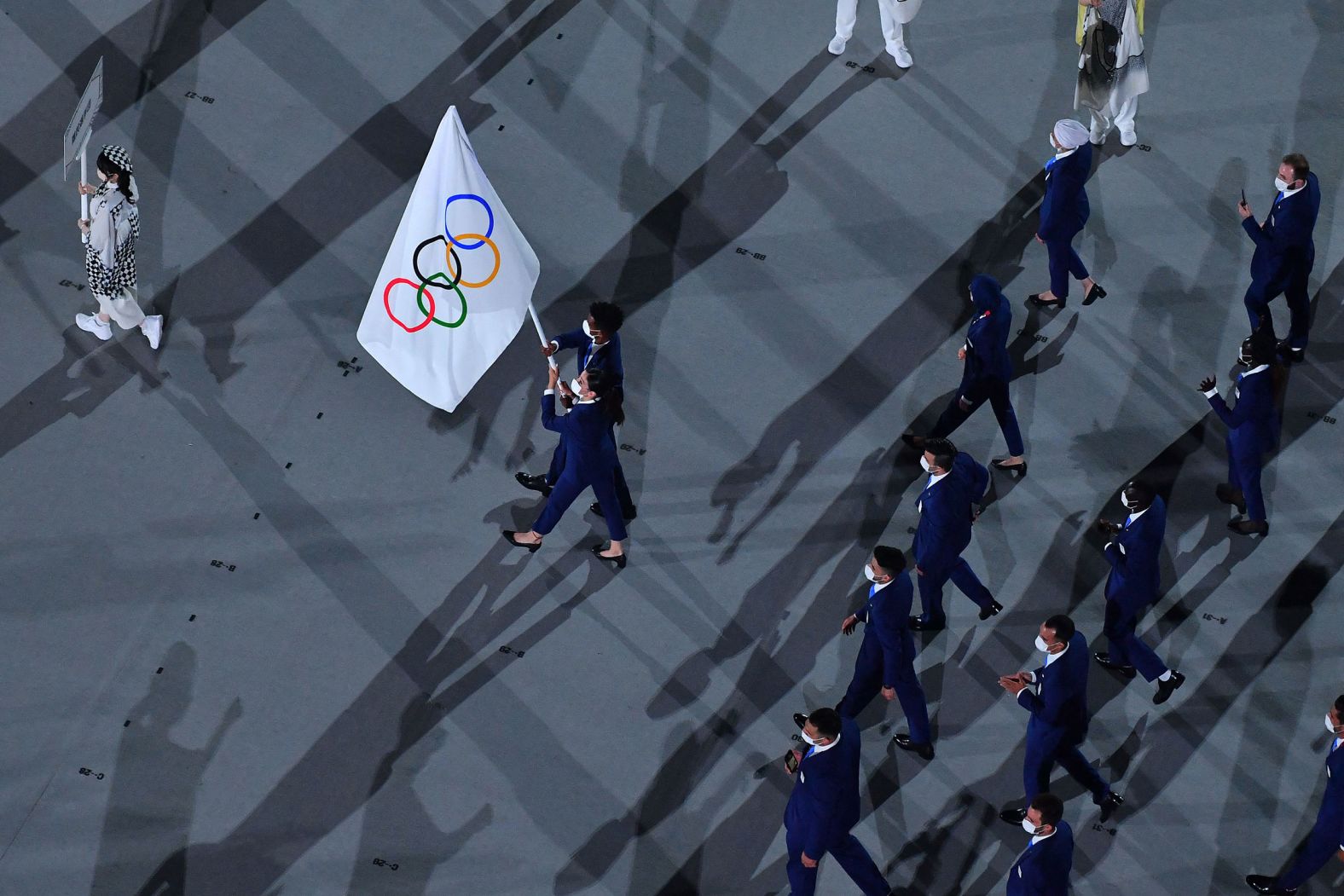 Members of the Refugee Olympic Team march during the parade of nations.