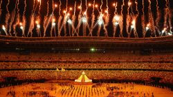 TOKYO, JAPAN - JULY 23: General view inside the stadium as fireworks go off while Naomi Osaka of Team Japan lights the Olympic cauldron with the Olympic torch during the Opening Ceremony of the Tokyo 2020 Olympic Games at Olympic Stadium on July 23, 2021 in Tokyo, Japan. (Photo by Laurence Griffiths/Getty Images)