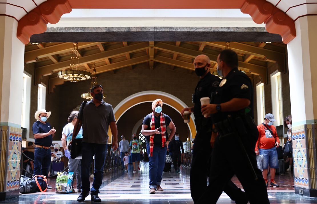 People wear face coverings at Union Station in Los Angeles on Monday, July 19. 