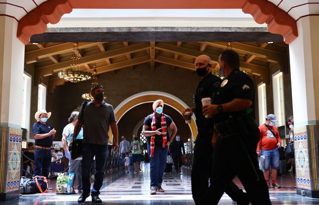People wear face coverings at Union Station in Los Angeles on Monday, July 19.
