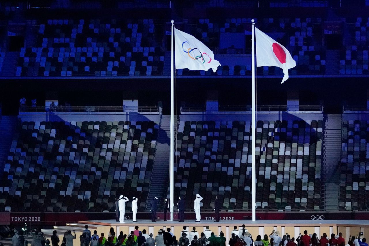 The Olympic flag is raised near the end of the opening ceremony.