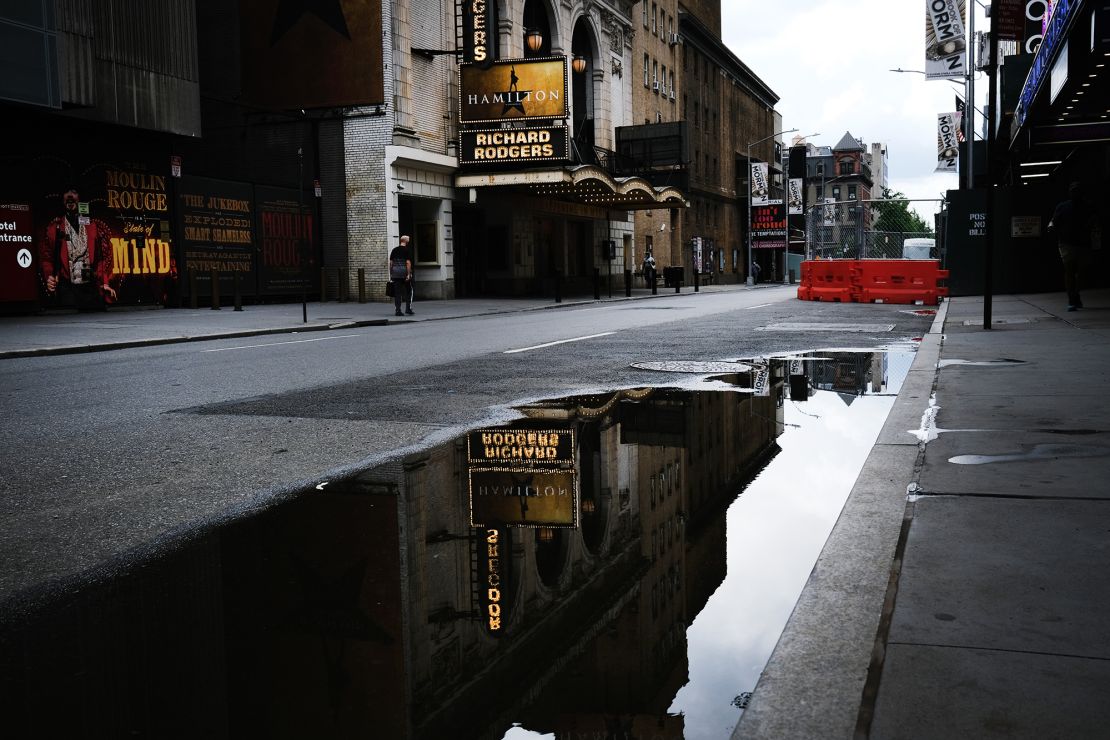 Broadway theaters stood closed along an empty street in the theater district on June 30, 2020, in New York City. As of May 2021, jobs in theater and dance were down 49% from where they were in February 2020.