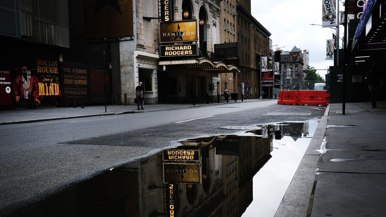 Broadway theaters stood closed along an empty street in the theater district on June 30, 2020, in New York City. As of May 2021, jobs in theater and dance were down 49% from where they were in February 2020.