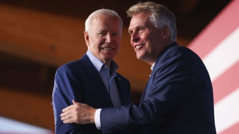 President Joe Biden, left, shakes hands with Terry McAuliffe, Democratic gubernatorial candidate for Virginia, during a campaign event in Arlington, Virginia, on Friday, July 23, 2021.