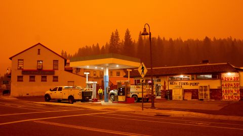 Firefighters gas up while battling the Dixie Fire in the Greenville community of Plumas County, California, on July 23, 2021.