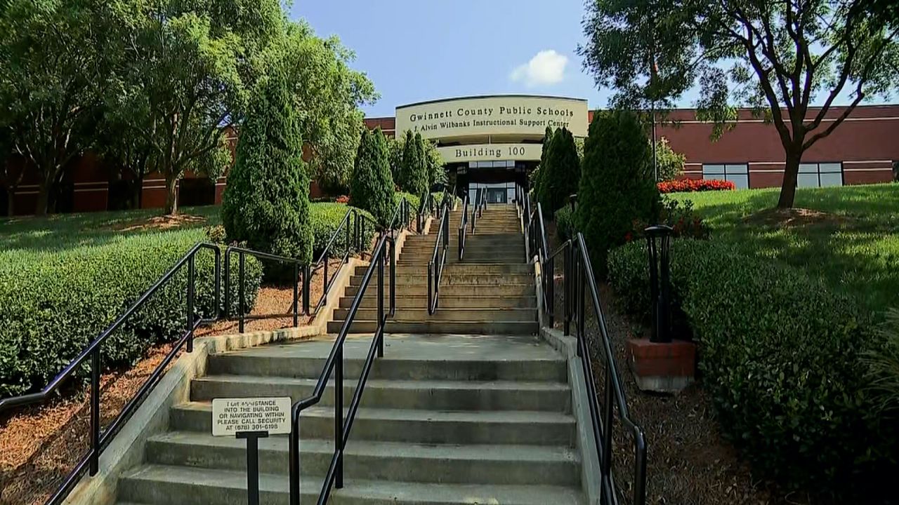 Schools in Gwinnett County, Georgia, offered full in-person school for much of last year, and did require masks inside.