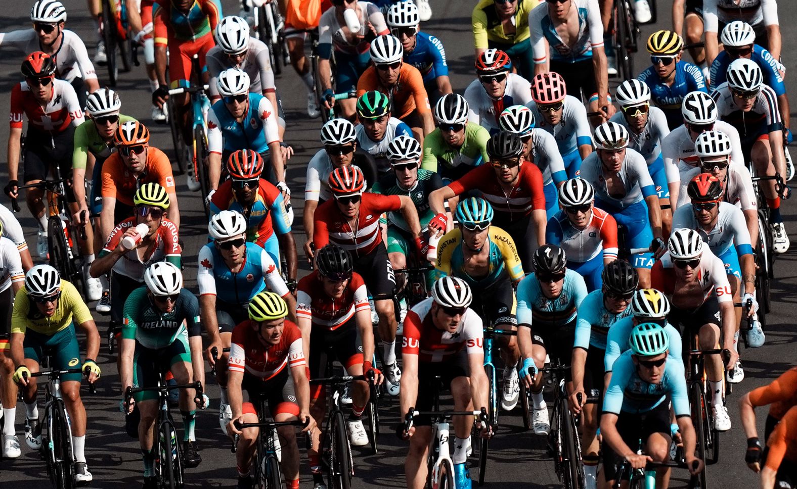 Cyclists compete in the men's road race on July 24. <a href="index.php?page=&url=https%3A%2F%2Fedition.cnn.com%2Fworld%2Flive-news%2Ftokyo-2020-olympics-07-24-21-spt%2Fh_865e6f42d17b1c92f727d4660ae7fa9a" target="_blank">Ecuador's Richard Carapaz</a> won the race after breaking away in the final 10 kilometers.