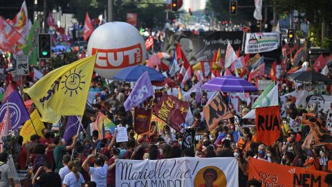 Demonstrators take part in a protest against Bolsonaro's government in downtown Rio de Janeiro on July 24.