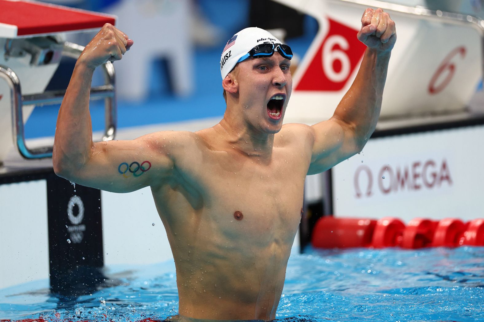 American swimmer Chase Kalisz celebrates after <a href="index.php?page=&url=https%3A%2F%2Fwww.cnn.com%2Fworld%2Flive-news%2Ftokyo-2020-olympics-07-24-21-spt%2Fh_c0d4c27f23d71040fdc15b662e33cae2" target="_blank">winning gold in the 400-meter individual medley</a> on July 25. It was the first medal for the United States in this year's Olympics.