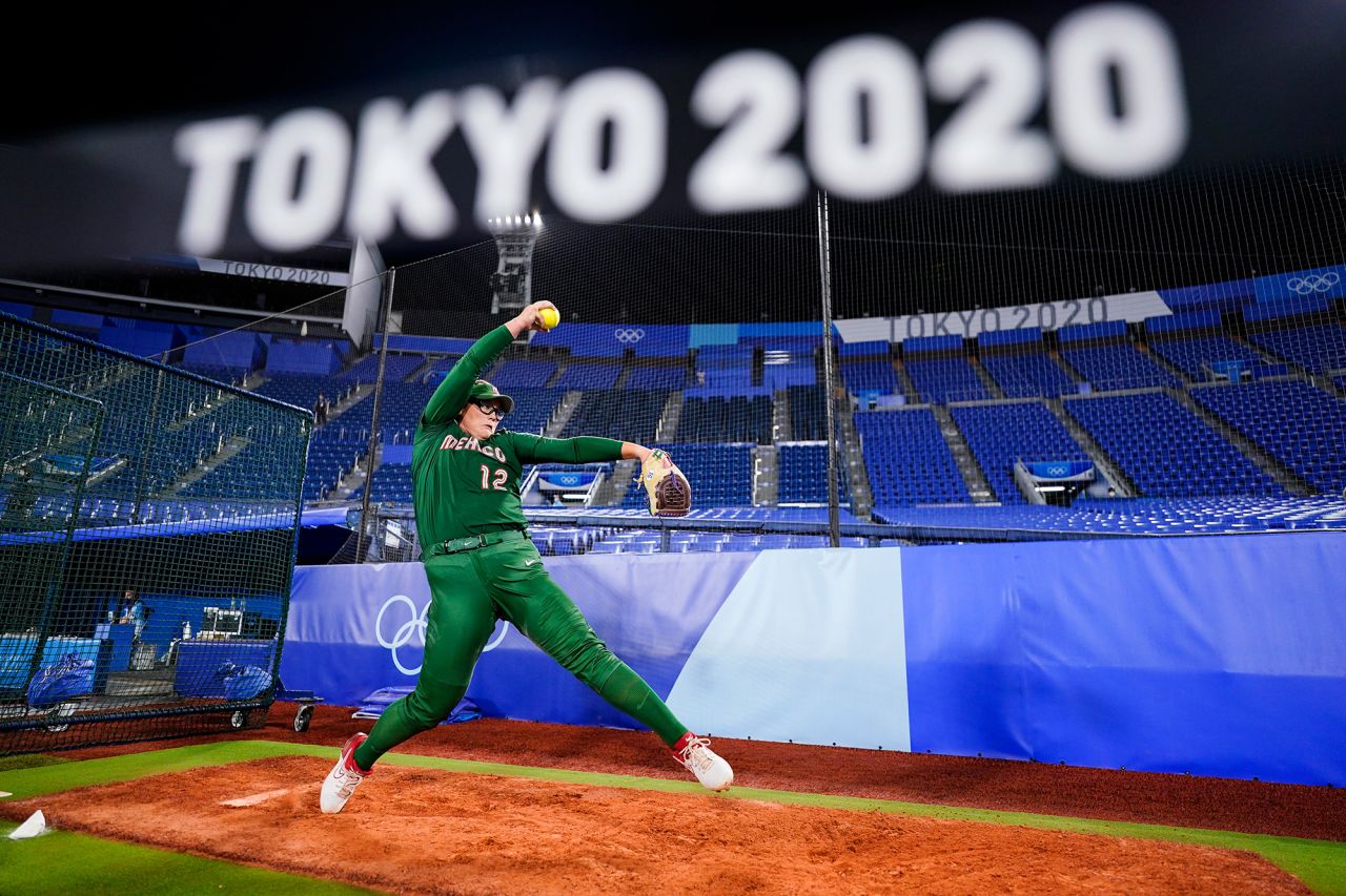Mexico's Dallas Escobedo warms up before a softball game against Italy on July 25. Softball is back at the Olympics for the first time since 2008.