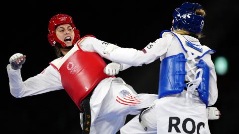 Tatiana Manina and Anastasija Zolotic compete in the women's -57kg taekwondo gold medal contest.
