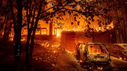 Flames consume a home as the Dixie Fire tears through the Indian Falls community in Plumas County, Calif., Saturday, July 24, 2021. The fire destroyed multiple residences in the area. (AP Photo/Noah Berger)
