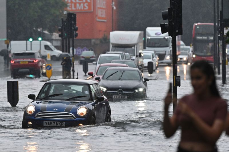 London flooding Thunderstorms leave roads submerged and some train