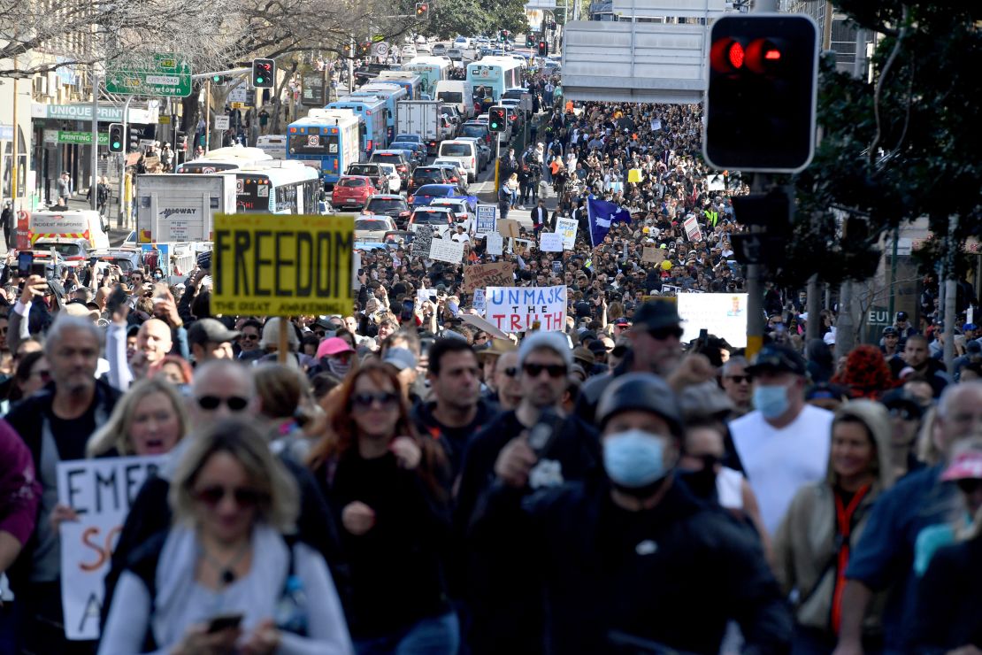 Protesters march through the streets during a 'World Wide Rally For Freedom' anti-lockdown rally in Sydney, on July 24.