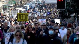 Protesters march through the streets during a 'World Wide Rally For Freedom' anti-lockdown rally in Sydney, Saturday, July 24, 2021.